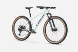 Trek Marlin 7 Gen 3 mountain bike with a black frame and front suspension, ready for trail riding and outdoor adventures.