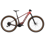 Trek Marlin+ 8 e-mountain bike with Bosch Active Line Plus motor, featuring rugged off-road tires and mountain bike frame.