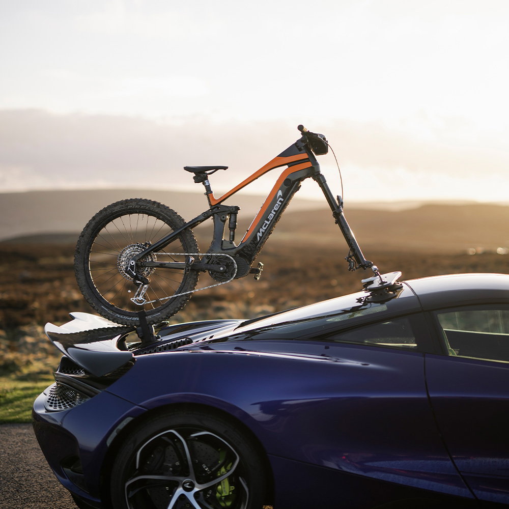 SeaSucker Bomber 3 Bike Rack with HUSKE Fork Mount vacuum system, showing the bike rack mounted on a vehicle with multiple bikes.