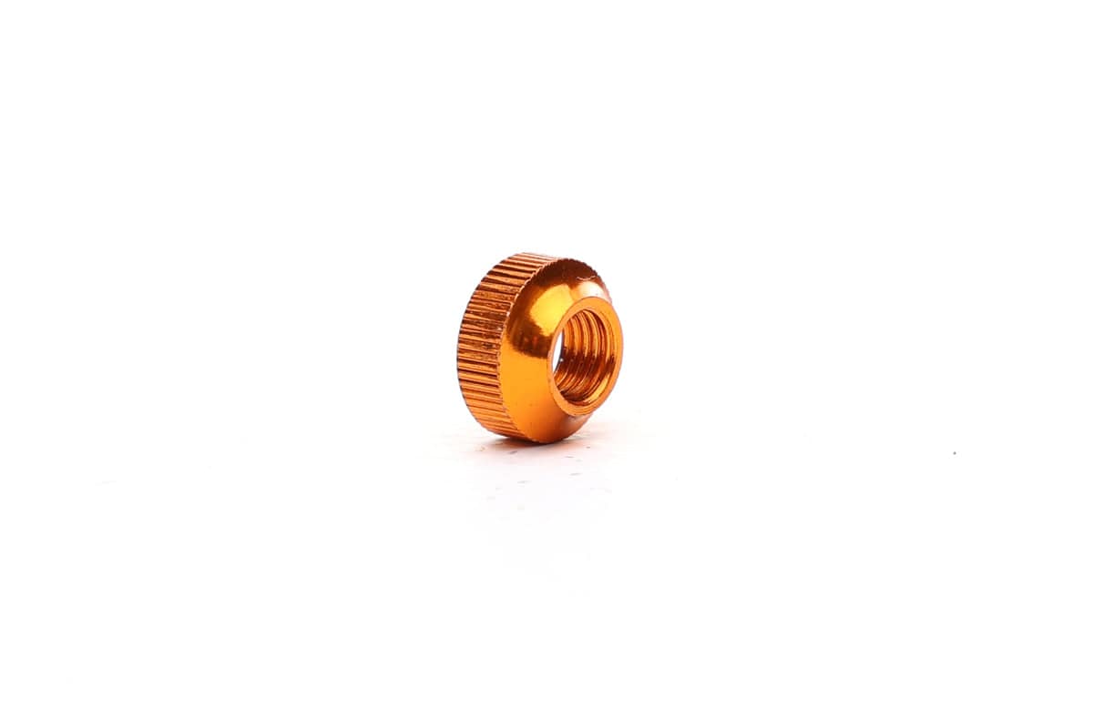 Orange Fatty's tubeless valve nut for secure, durable seal on tubeless valve stems in bicycle wheel components.