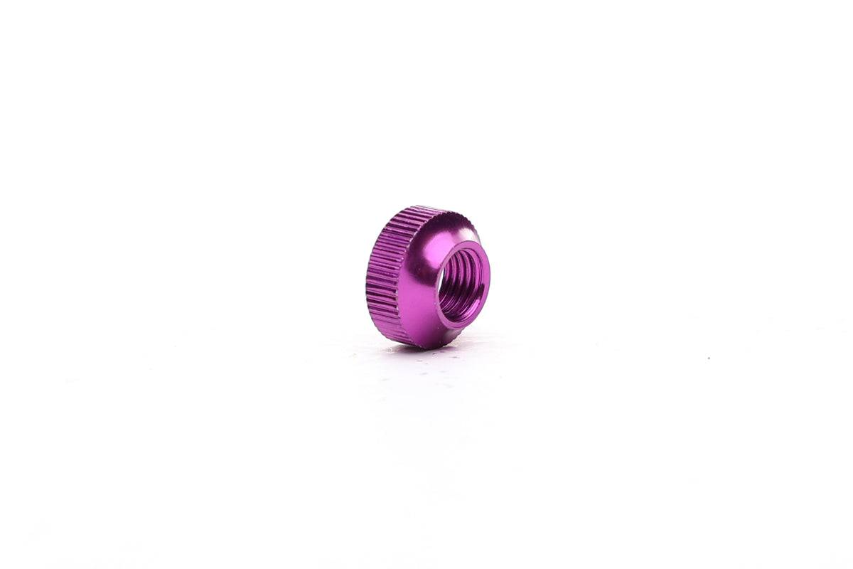 Purple Fatty's tubeless valve nut for secure and durable sealing of tubeless valve stems on bicycle wheels.