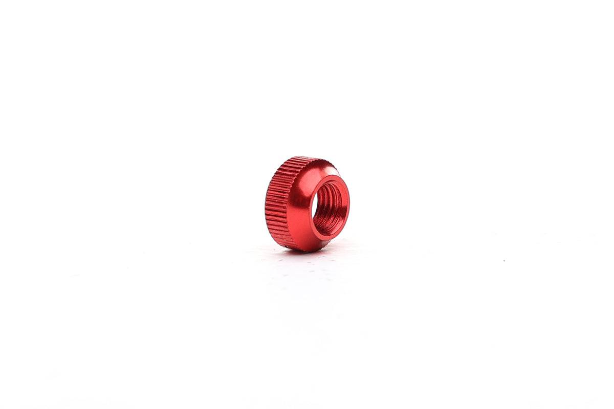 Red Fatty's tubeless valve nut for secure, durable seal on tubeless valve stems, designed for bike wheel components.