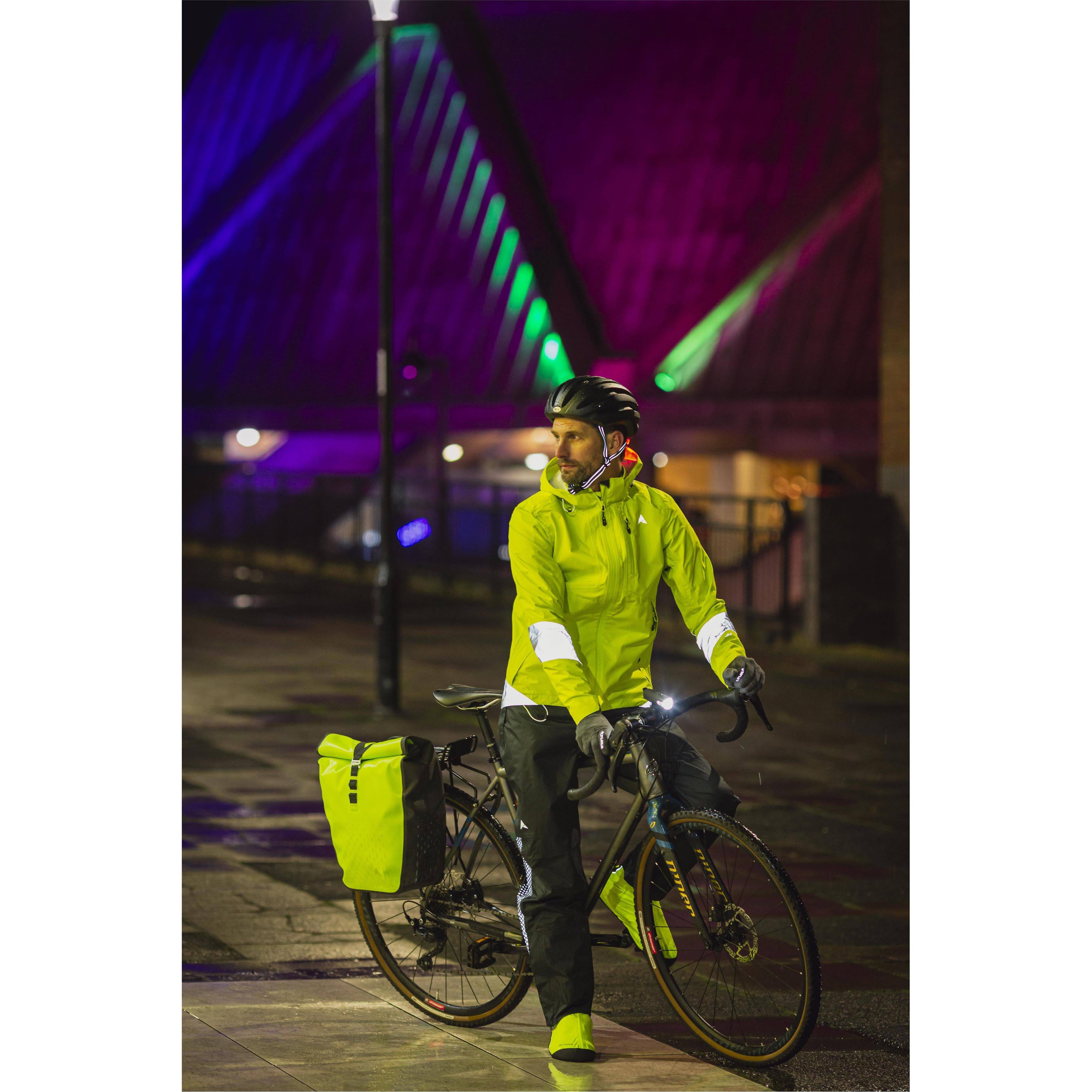 Altura Nightvision men's long waterproof cycling overtrousers, showing the dark, lightweight, water-resistant fabric and adjustable waist.
