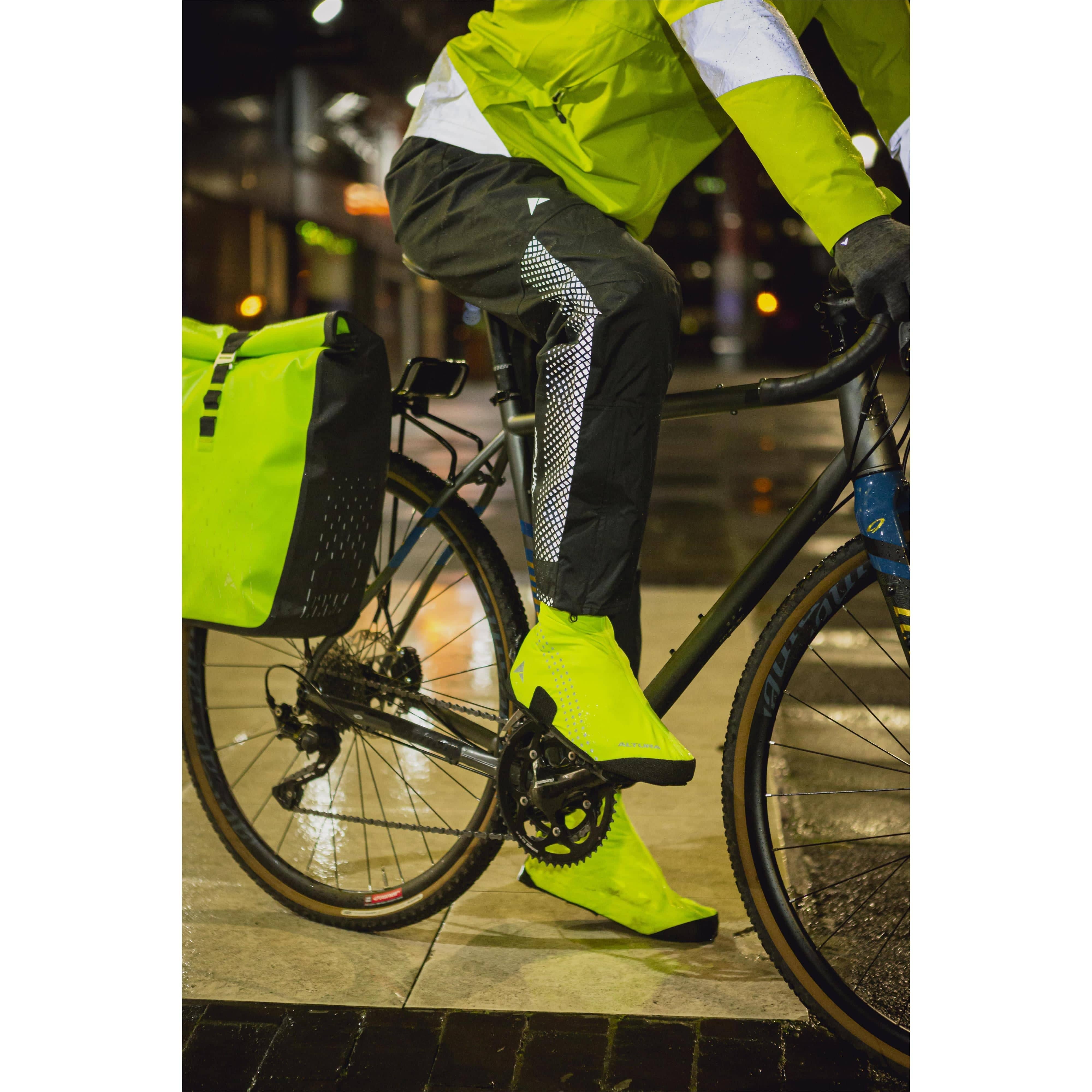 Altura Nightvision men's waterproof cycling overtrousers, long overpants with reflective details for outdoor riding in wet conditions.