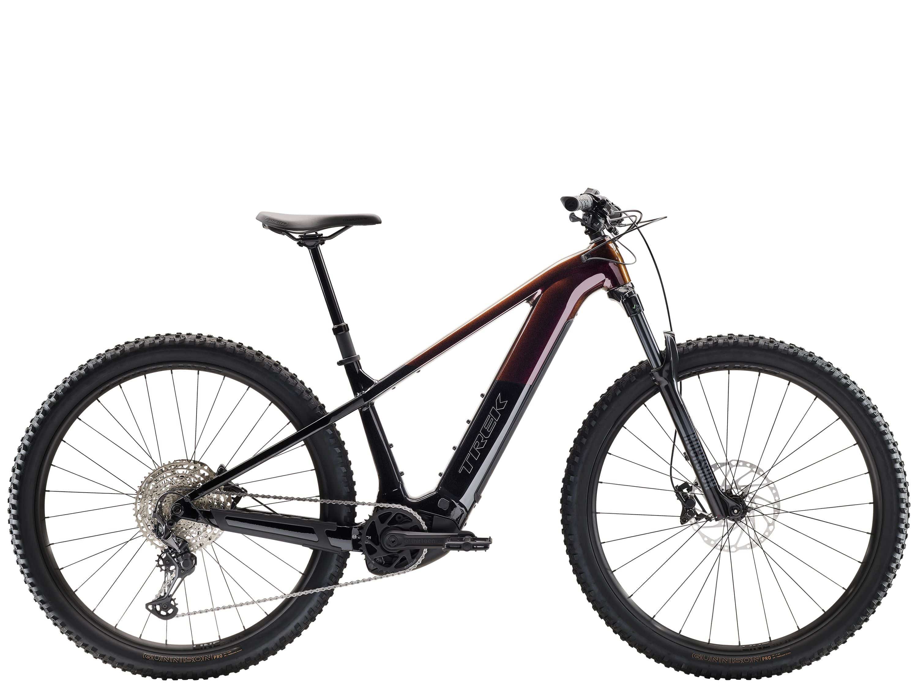 Trek Powerfly+ 6 Gen 5 electric mountain bike with 29-inch wheels and Shimano Deore XT drivetrain, displayed outdoors.
