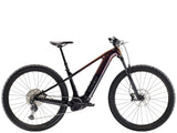 Trek Powerfly+ 6 Gen 5 electric mountain bike with 29-inch wheels and Shimano Deore XT drivetrain, displayed outdoors.