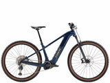 Trek Powerfly+ 6 Gen 5 electric mountain bike with 29-inch wheels and Shimano Deore XT drivetrain, ready for trail riding.