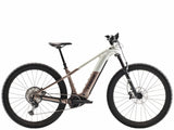 Trek Powerfly+ 8 electric mountain bike with Gen 5 motor and Shimano Deore XT drivetrain, shown from the front angle.