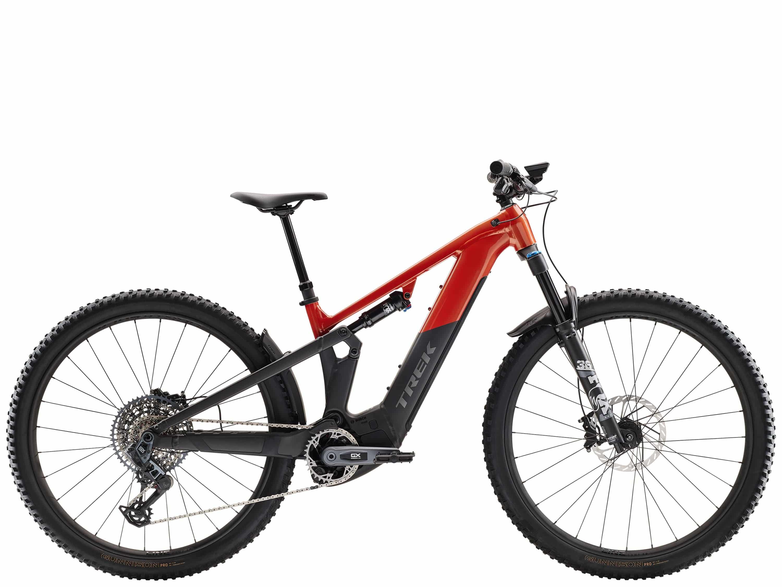 Trek Powerfly FS+ 8 2025 electric mountain bike with Gen 4 motor and SRAM GX AXS drivetrain, shown in a rugged outdoor setting