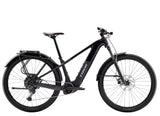 Trek Powerfly+ 4 equipped Gen 5 E-mountain bike with 800Wh removable battery, shown from the side with rugged tires and frame.