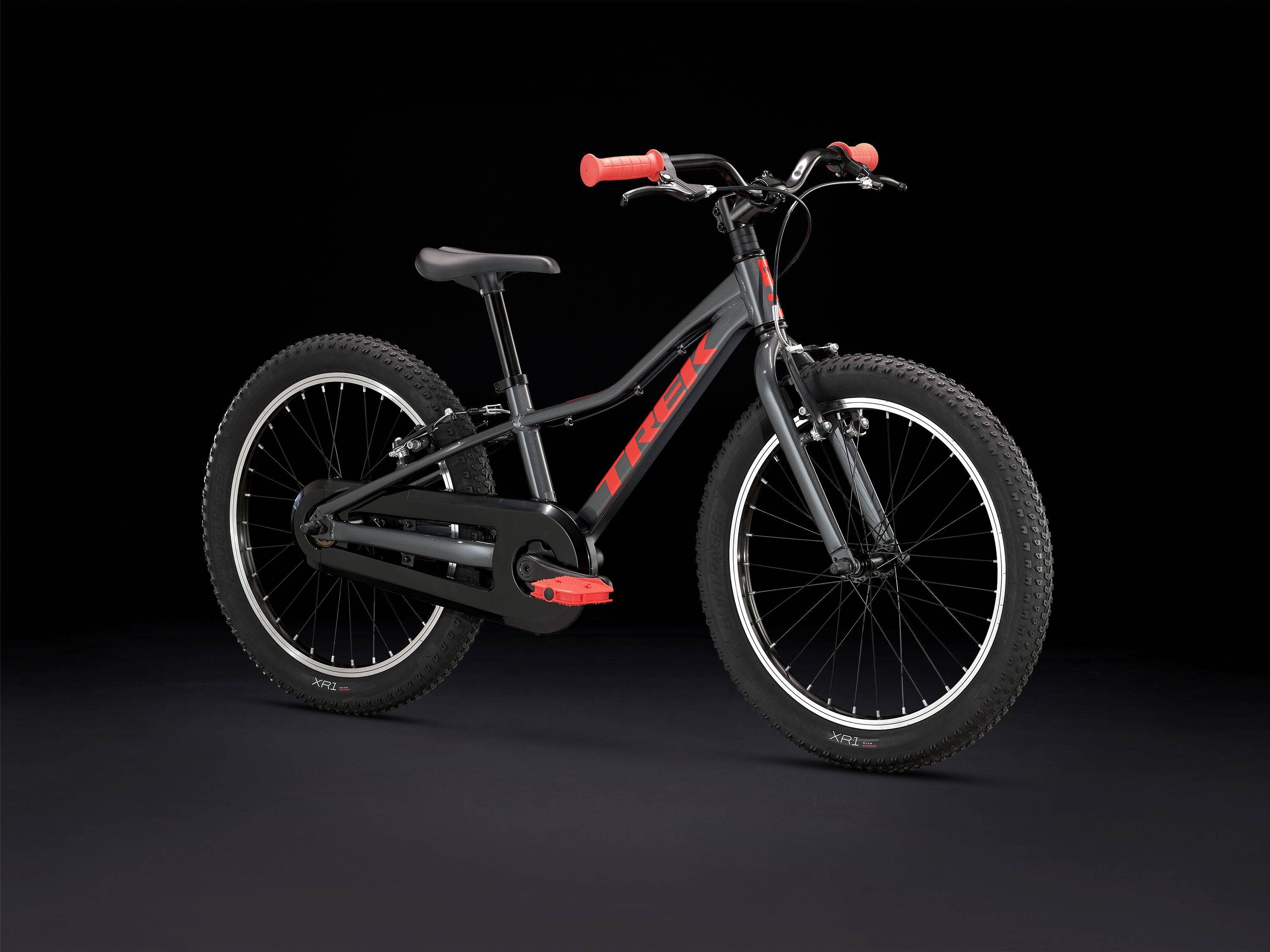 Trek Precaliber 20 kids' mountain bike with integrated handle for trail riding, featuring a sturdy frame and colorful design.