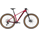 Trek Procaliber 8 mountain bike with Shimano XT groupset, showcasing its lightweight frame and off-road trail riding features.