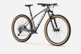 Trek Procaliber 9.5 Gen 3 mountain bike with IsoBow frame technology, shown in portrait view, designed for trail performance.