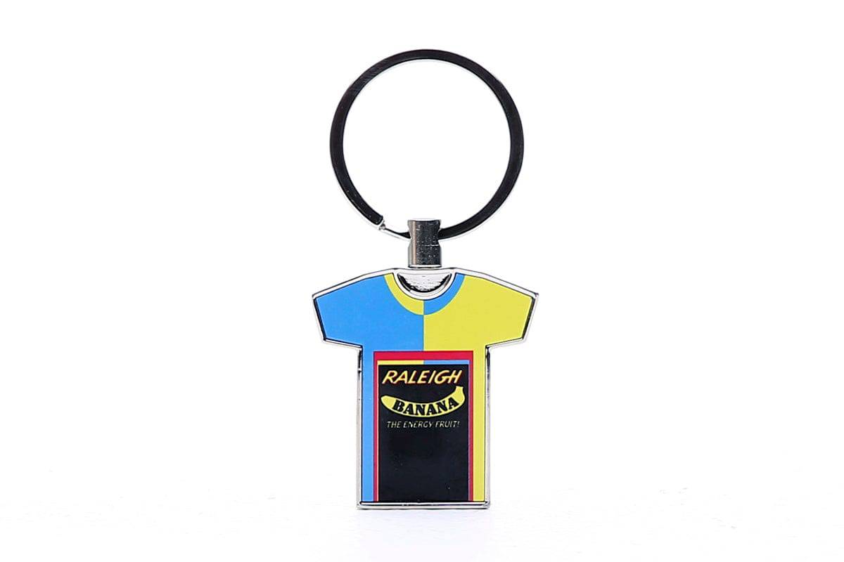 Global Cycling Club Raleigh Banana Team Jersey keyring featuring a white design, a durable cycling accessory for fans.