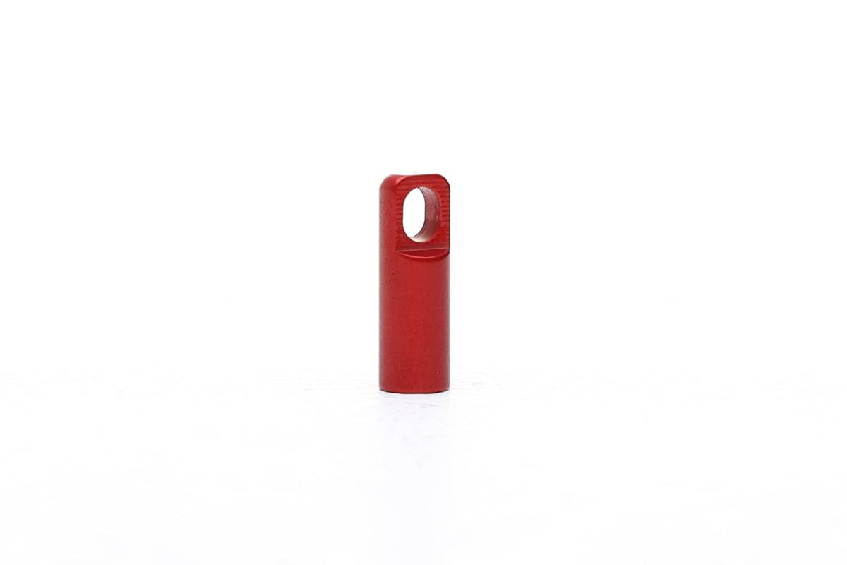 Red Fatty's valve dustcap with integrated valve removal tool, designed for easy workshop maintenance and tire care.