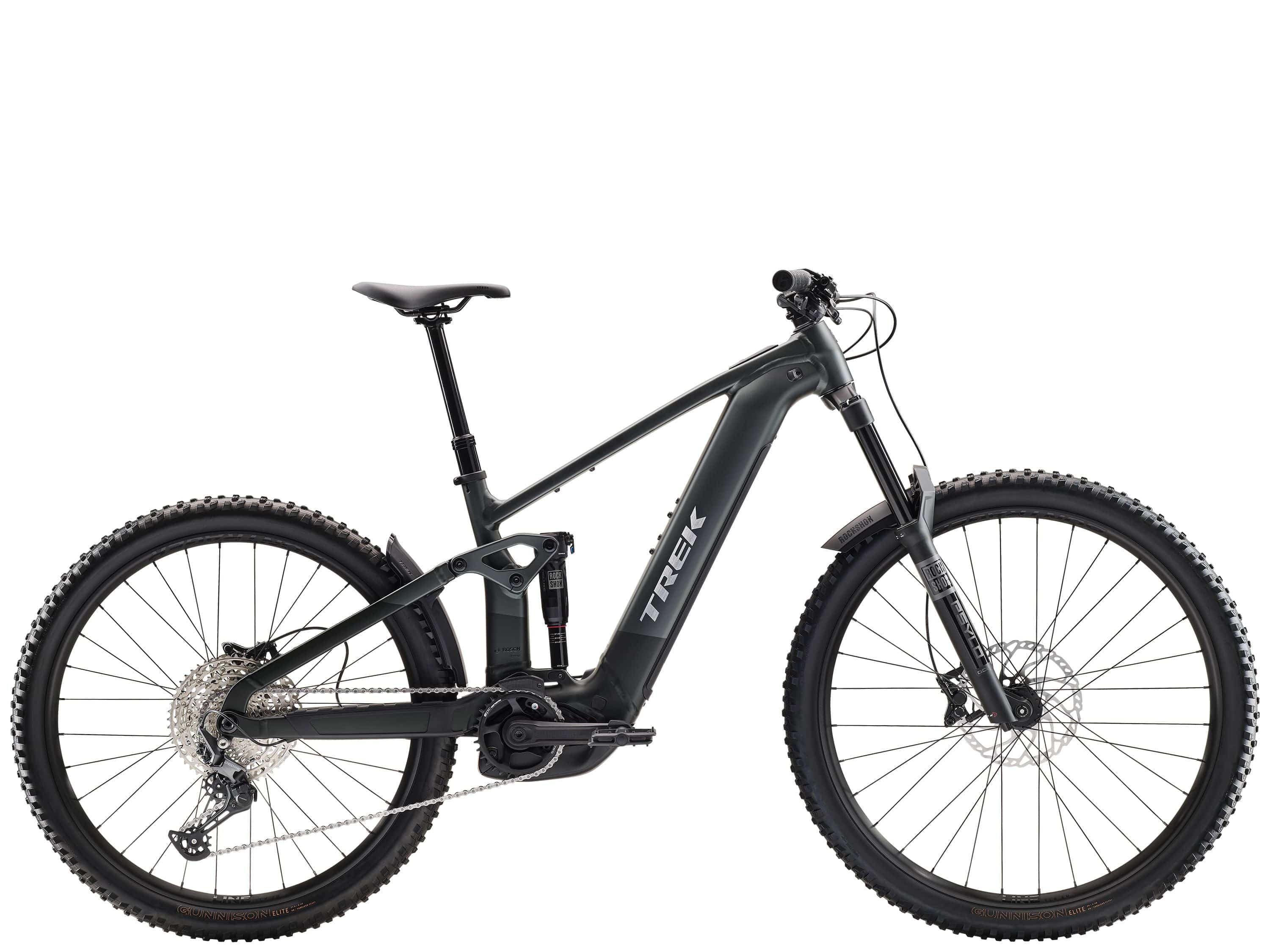 Trek Rail+ 5 Gen 5 electric mountain bike with 29-inch wheels and Shimano Deore M6100 gears, black frame, and suspension.