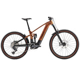 Trek Rail+ 9.8 GX AXS 2025 electric mountain bike with 29-inch wheels and Gen 5 motor, black frame and suspension.