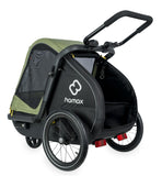 Green Hamax Pluto Medium Dog Trailer for 2023, with bike trailer and stroller kit, shown in the image.