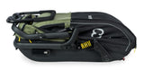 Green Hamax Pluto Medium Dog Trailer for 2023, showing the bike trailer and stroller accessories attached to a bicycle.