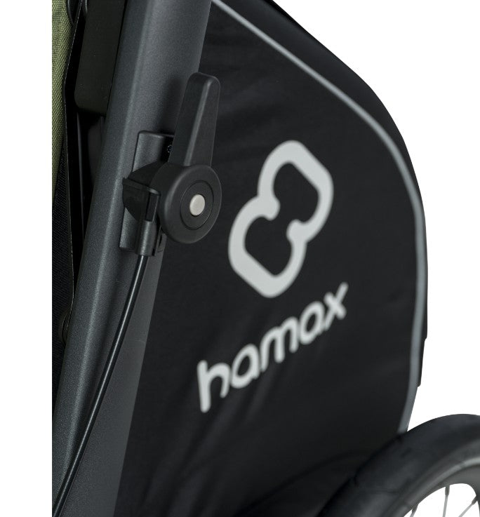 Hamax Pluto Medium Dog Trailer in green, shown as a versatile bike trailer and stroller accessory for small to medium dogs.