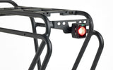 Trek BackRack Deluxe MIK rear bike rack with integrated mounts and light attachment, designed for bike accessories and touring.