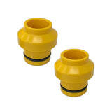 Pair of SeaSucker 15x110mm Boost HUSKE plugs for front hub fork mounts, black plastic accessories for bike wheel compatibility.
