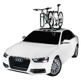 SeaSucker Mini Bomber 2-bike fork-mount vacuum rack attached to a car roof for e-bikes, showcasing durable bike transport accessories.