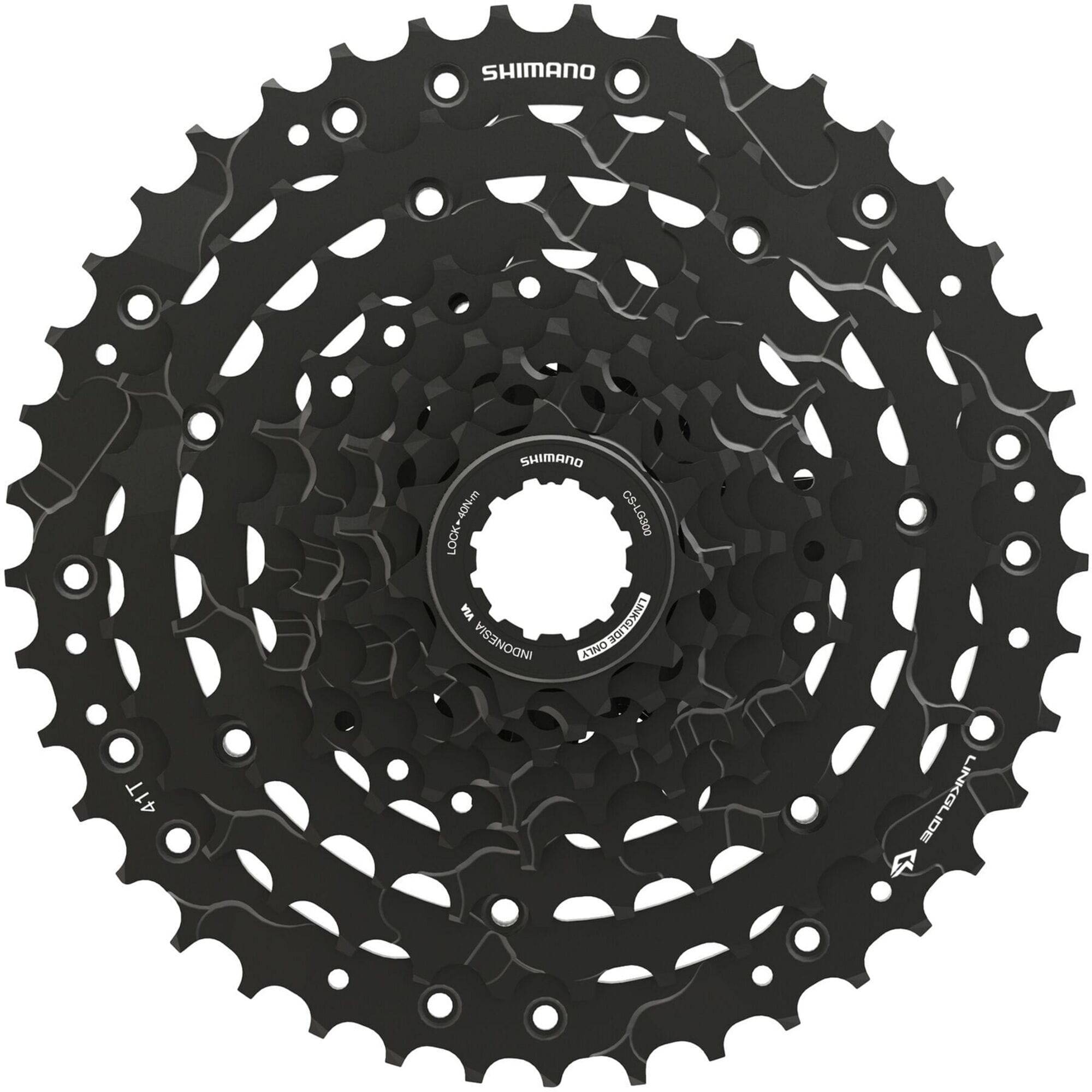 Shimano CUES CS-LG300-9 Link Glide 9-speed cassette for multi-purpose bikes and e-bikes, displayed on a bike wheel.