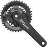 Shimano CUES FC-U4010 2-piece MTB crankset for 9-11-speed drivetrains, showing silver crank arms with chainring attachment points.