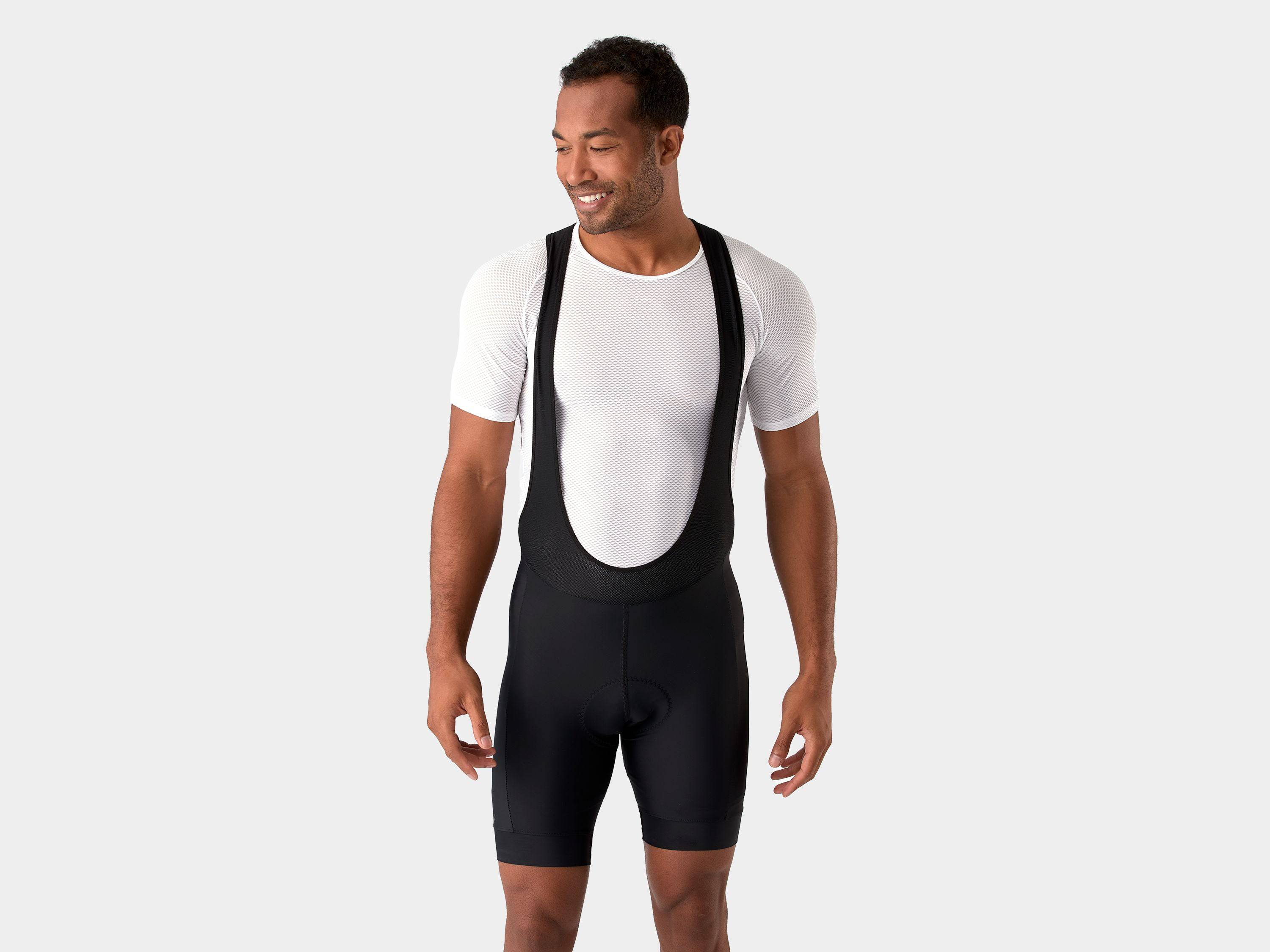 Trek Solstice unisex cycling bib shorts, eco-friendly performance clothing with padded seat and breathable fabric.