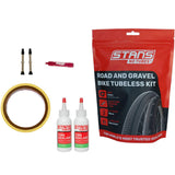 Stan's No Tubes Road Tubeless Kit with yellow tape, valves, and sealant components for bike tubeless tire setup.