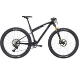 Trek Supercaliber SLR 9.8 XT Di2 Gen 2 mountain bike with IsoStrut suspension, black frame, and advanced gear components.