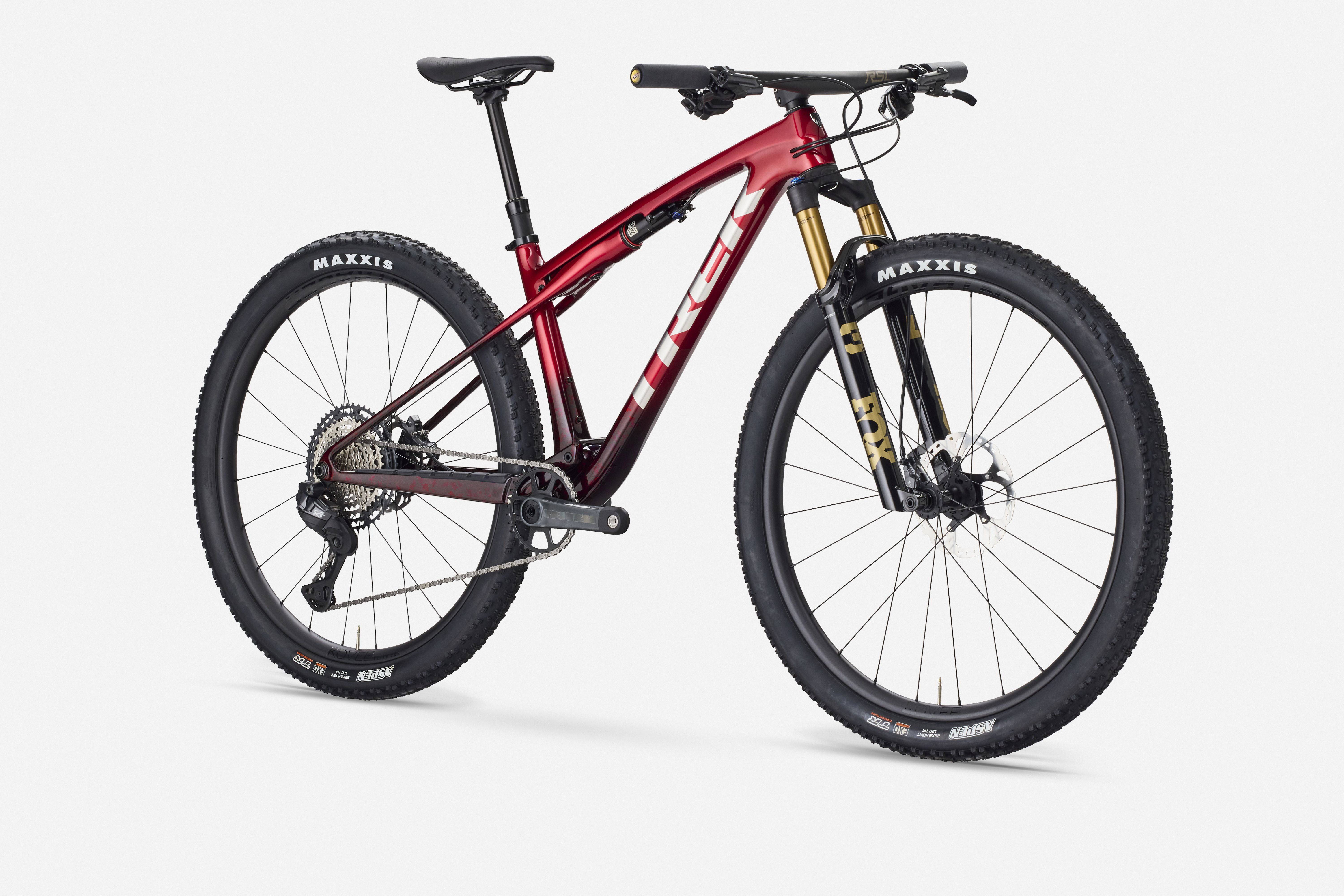Trek Supercaliber SLR 9.8 XT Di2 mountain bike with IsoStrut suspension system, shown in a portrait view.