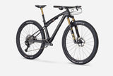 Trek Supercaliber SLR 9.9 XTR Di2 mountain bike with IsoStrut rear suspension and sleek frame design.
