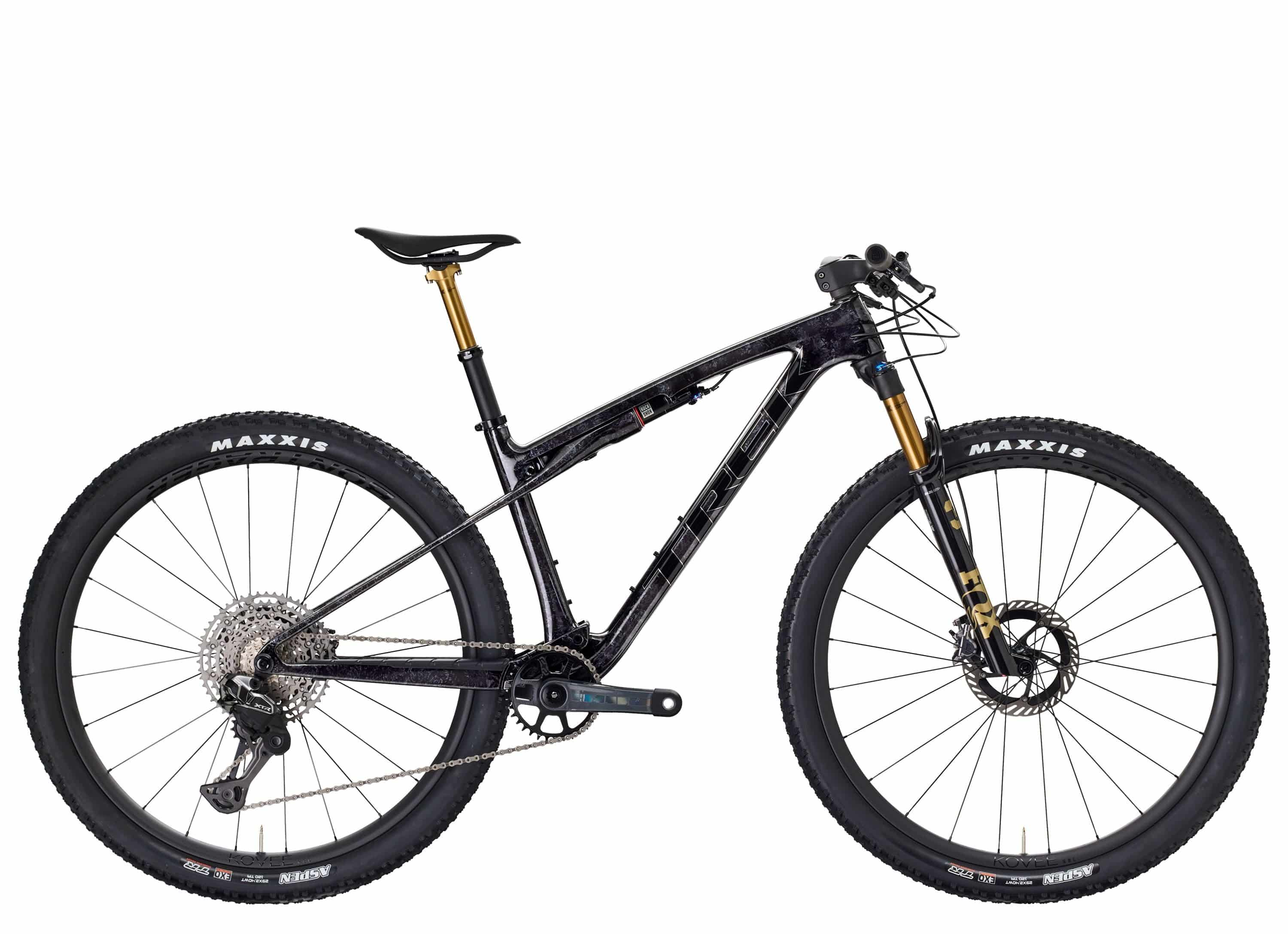 Trek Supercaliber SLR 9.9 XTR Di2 mountain bike with IsoStrut rear suspension, black frame, and high-performance components.