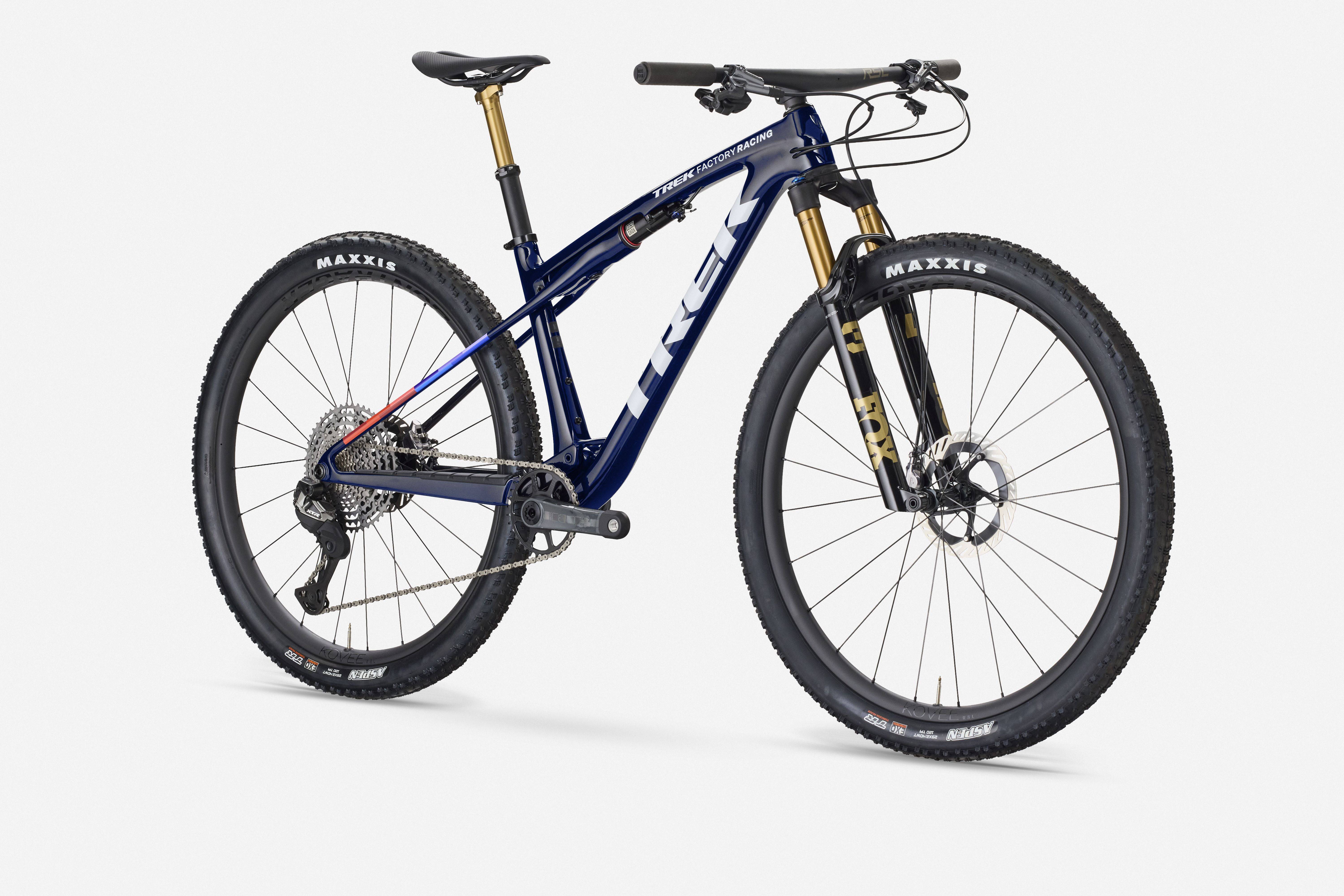 Trek Supercaliber SLR 9.9 XTR Di2 mountain bike with IsoStrut rear suspension and sleek frame design.
