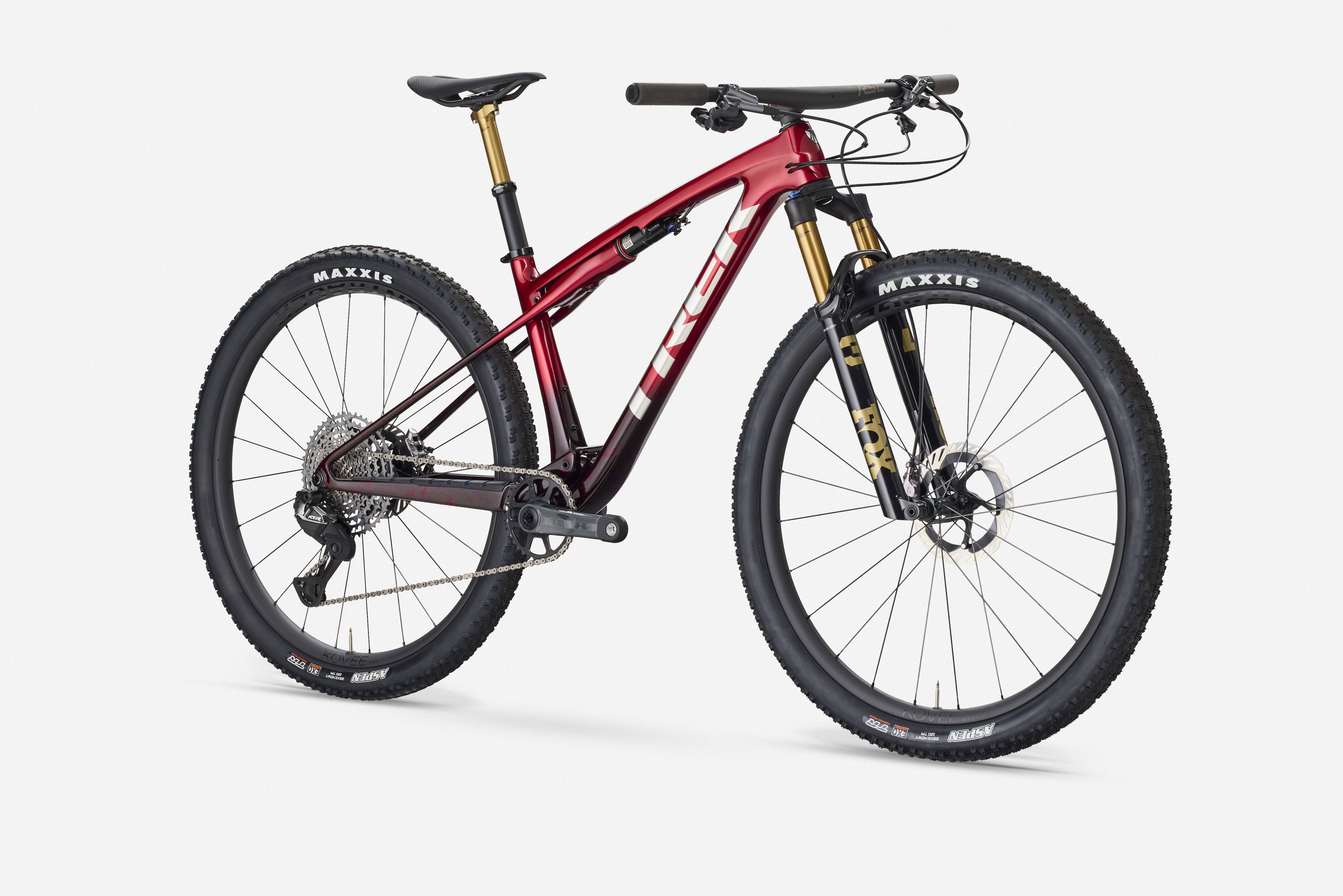 Trek Supercaliber SLR 9.9 XTR Di2 mountain bike with IsoStrut rear suspension, sleek frame, and high-performance components.