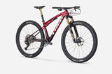 Trek Supercaliber SLR 9.9 XTR Di2 mountain bike with IsoStrut rear suspension, sleek frame, and high-performance components.