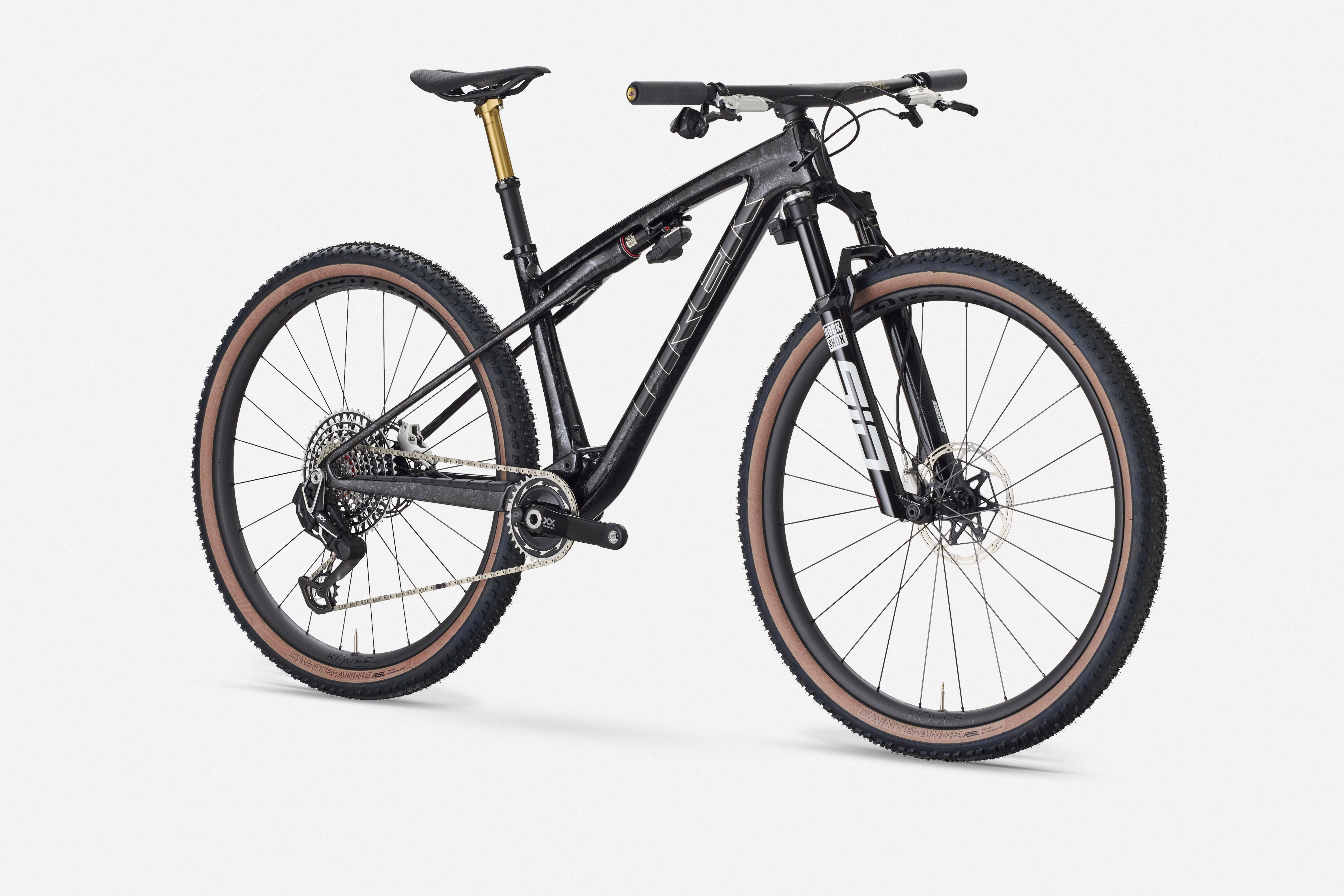 Trek Supercaliber SLR 9.9 XX AXS Flight Attendant cross-country mountain bike, front view with sleek frame and suspension details