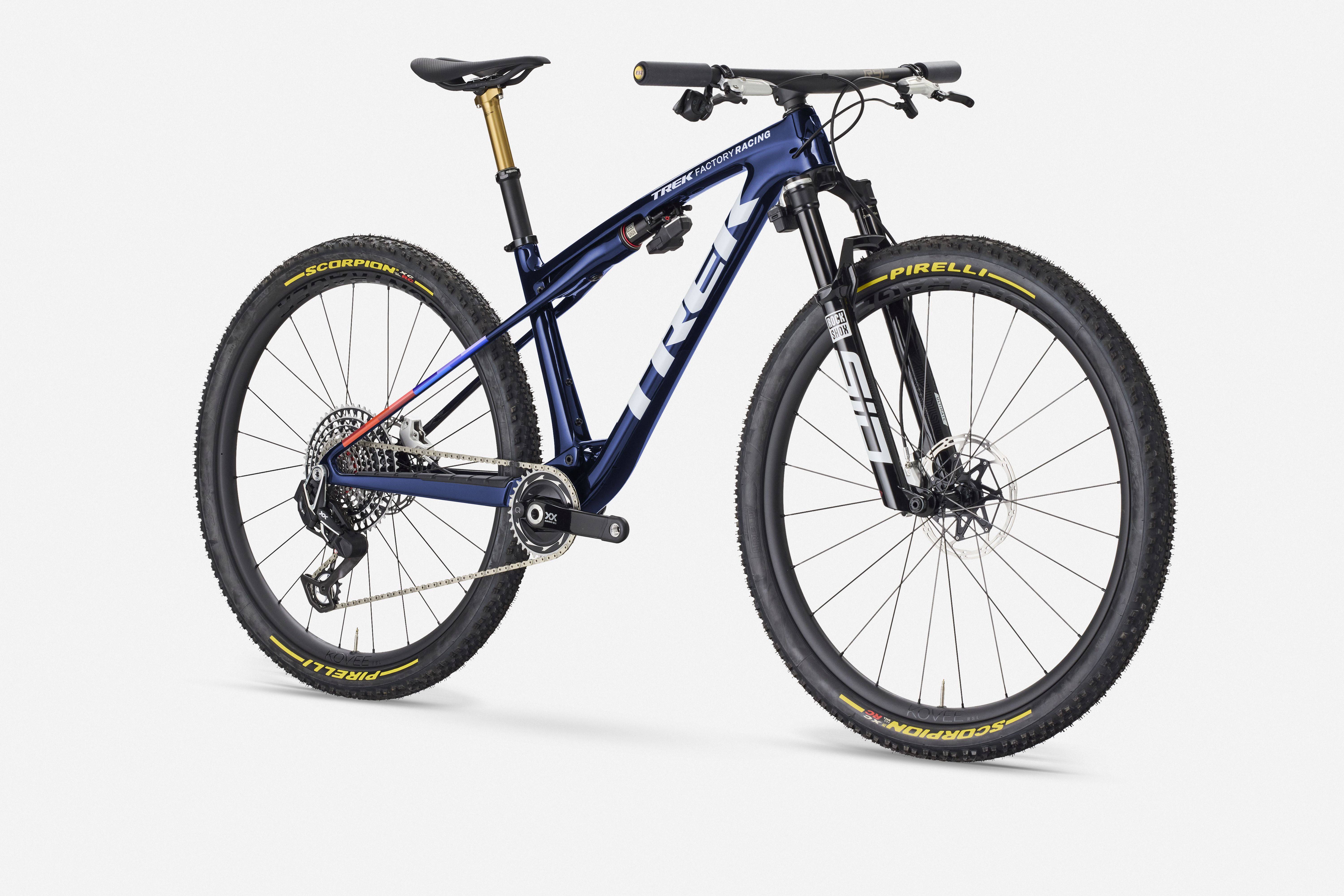 Trek Supercaliber SLR 9.9 XX AXS Flight Attendant cross-country mountain bike, front view showing sleek frame and suspension system.