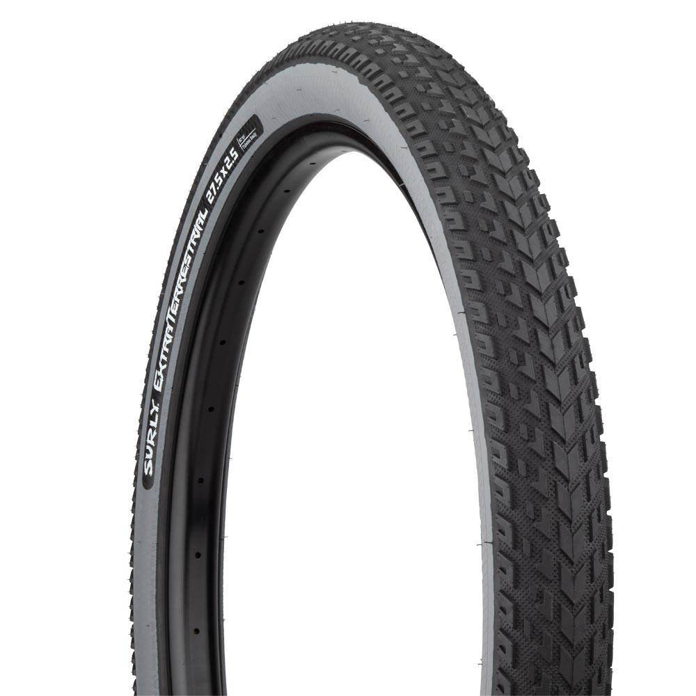 Surly ExtraTerrestrial 27.5-inch tubeless-ready off-road touring bicycle tire mounted on wheel, ready for rugged terrain.