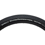 Surly ExtraTerrestrial 26-inch tubeless-ready mountain bike tire with rugged tread for hardpack and touring terrain.