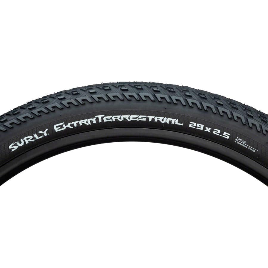 Surly ExtraTerrestrial 29x2.5 MTB tire with tubeless compatibility, durable touring tire suitable for mountain biking.