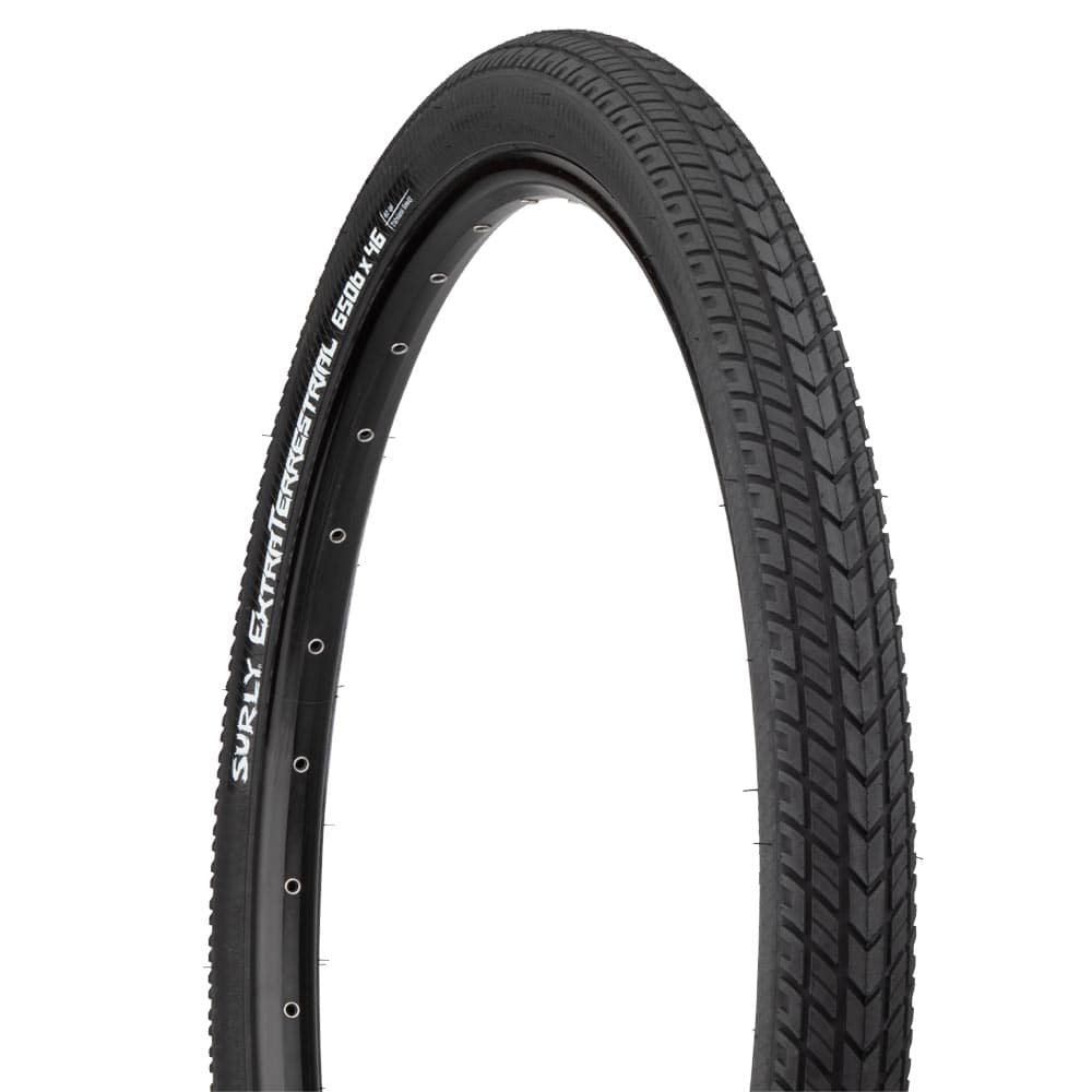 Surly ExtraTerrestrial 27.5 tubeless-ready off-road touring tyre with cut protection mounted on a mountain bike wheel.