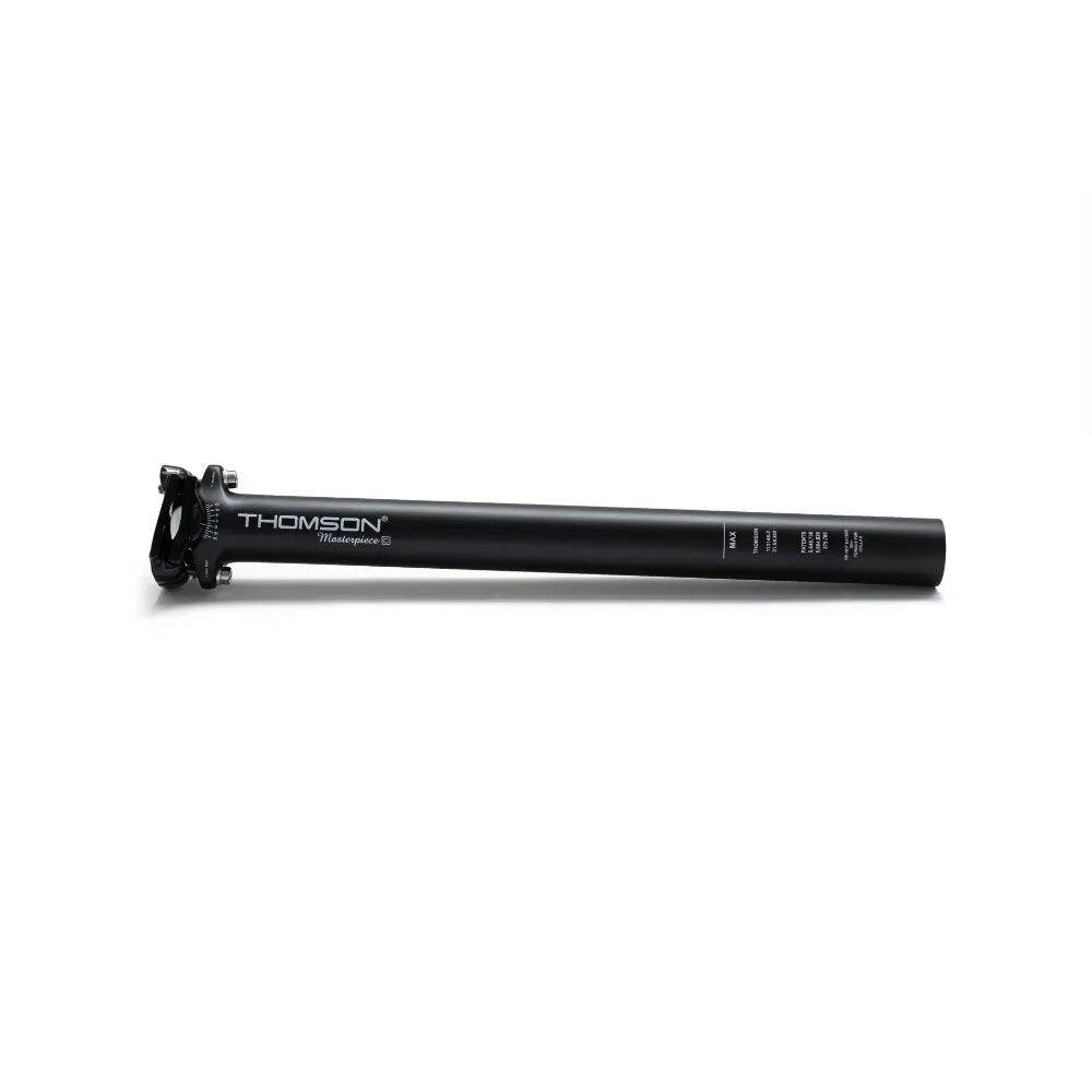 Thomson Masterpiece carbon fiber bicycle seatpost with matte finish, titanium hardware, and alloy clamp attached.