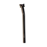 Thomson Masterpiece setback MTB seatpost in black with infinite tilt adjustment, showing the sleek component design and clamp mechanism.