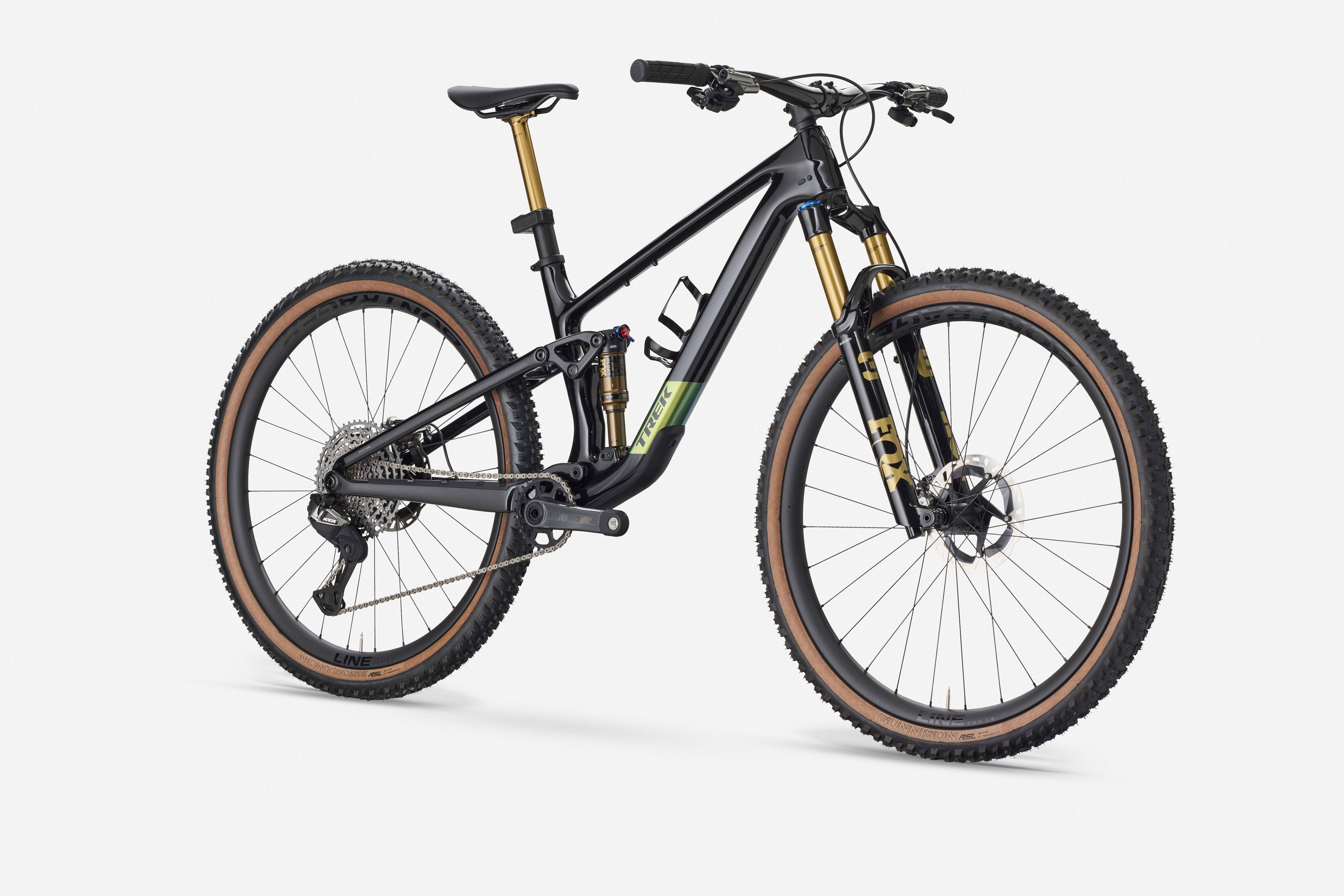 Trek Top Fuel 9.9 XTR Di2 mountain bike with electronic shifting and adjustable suspension, showing the bike's frame and front wheel.