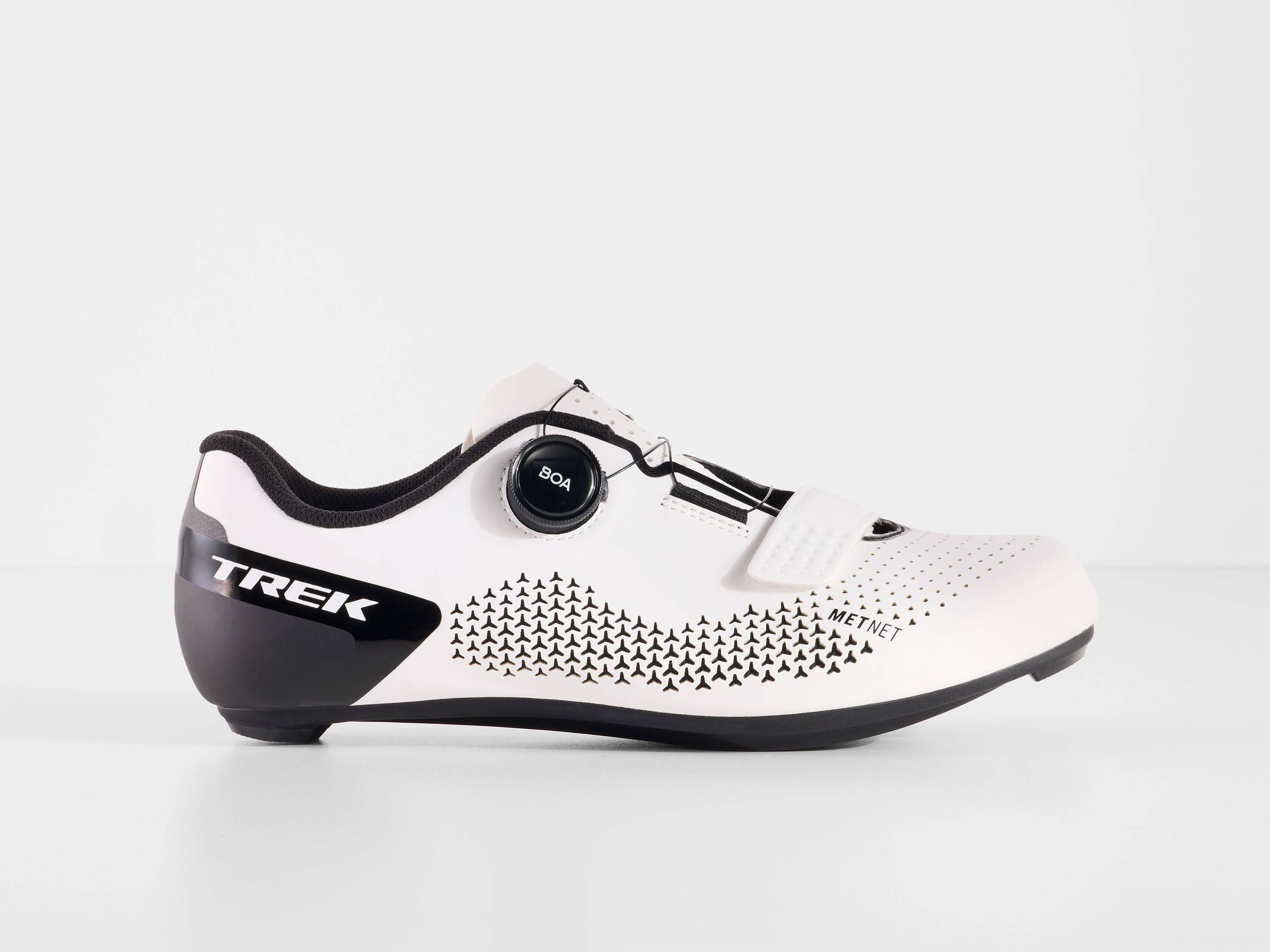 Unisex Trek Circuit road cycling shoes in black with secure straps and cleat mounts, designed for performance road biking.