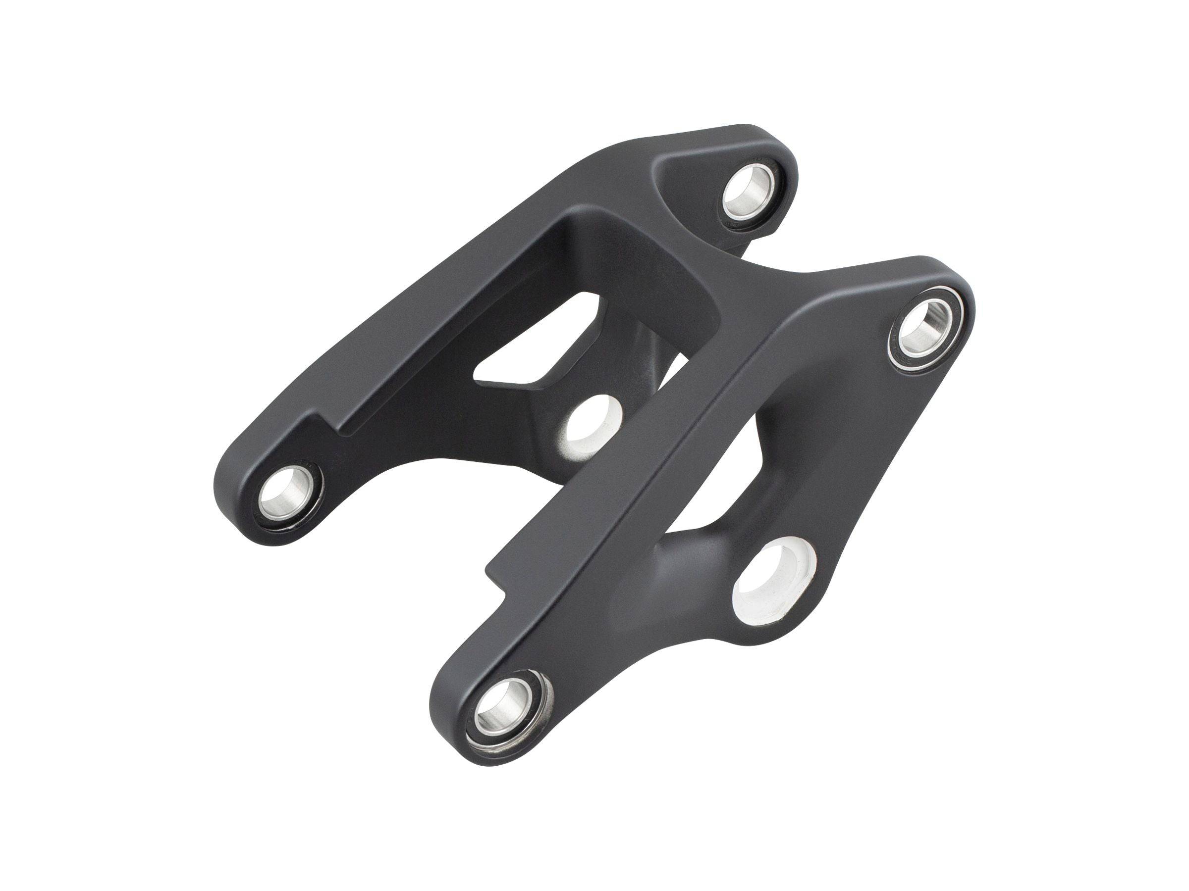 Trek Fuel EX 29 magnesium rocker link component for 2023-2025 carbon bike frame, shown in close-up detail.