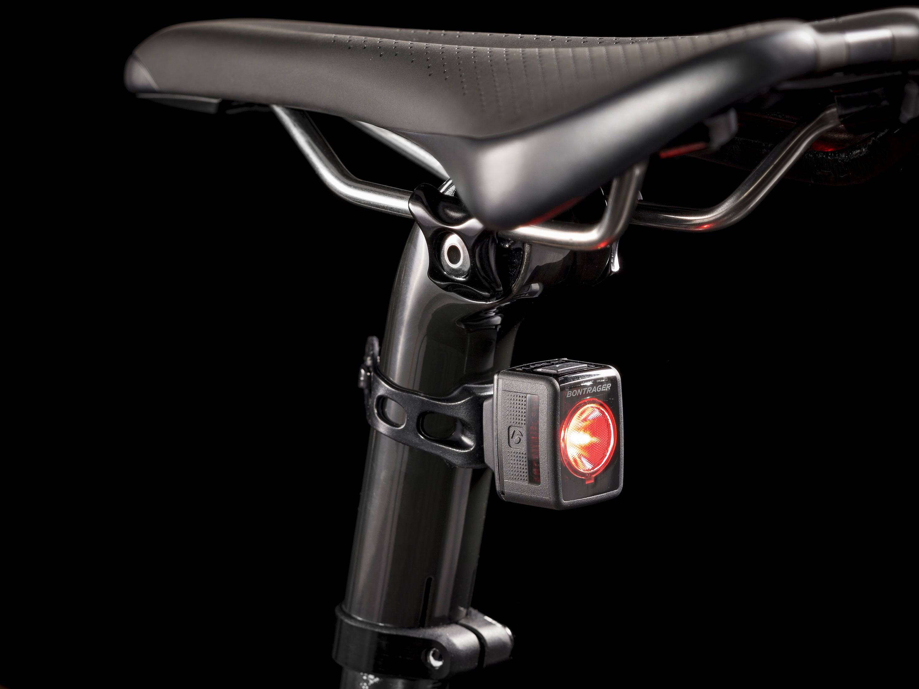 Trek seatpost with matching carbon seatmast cap and 7mm round saddle clamp ears, shown on a bike component.